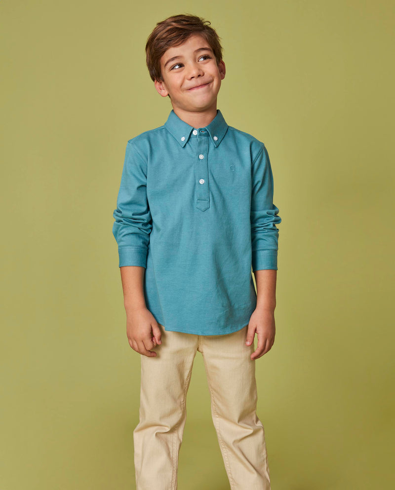 Camisa polo azul brillante para niño