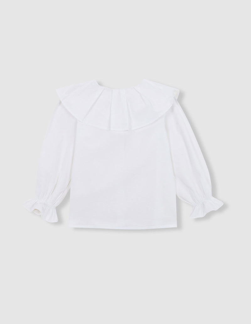 Blusa cuello pétalos