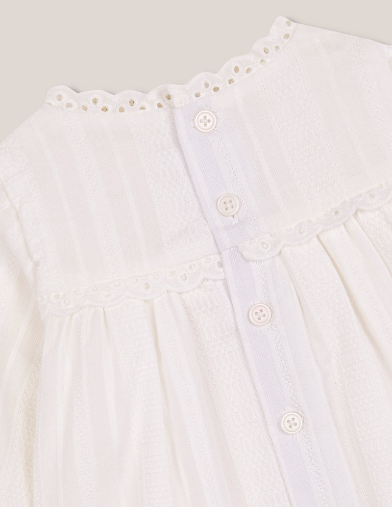 Vestido de manga larga con jaretas
