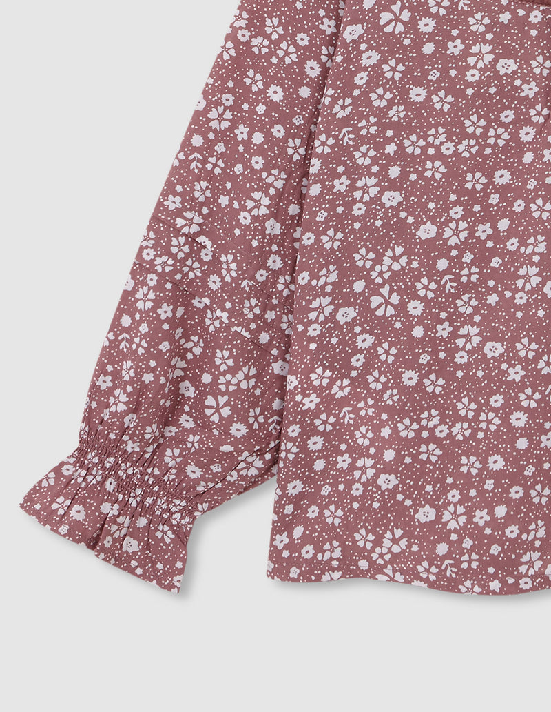 Blusa manga larga estampado bicolor