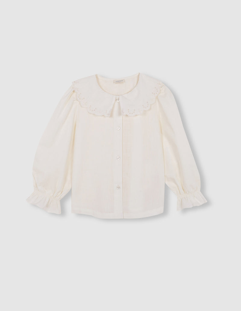 Blusa cuello ondas