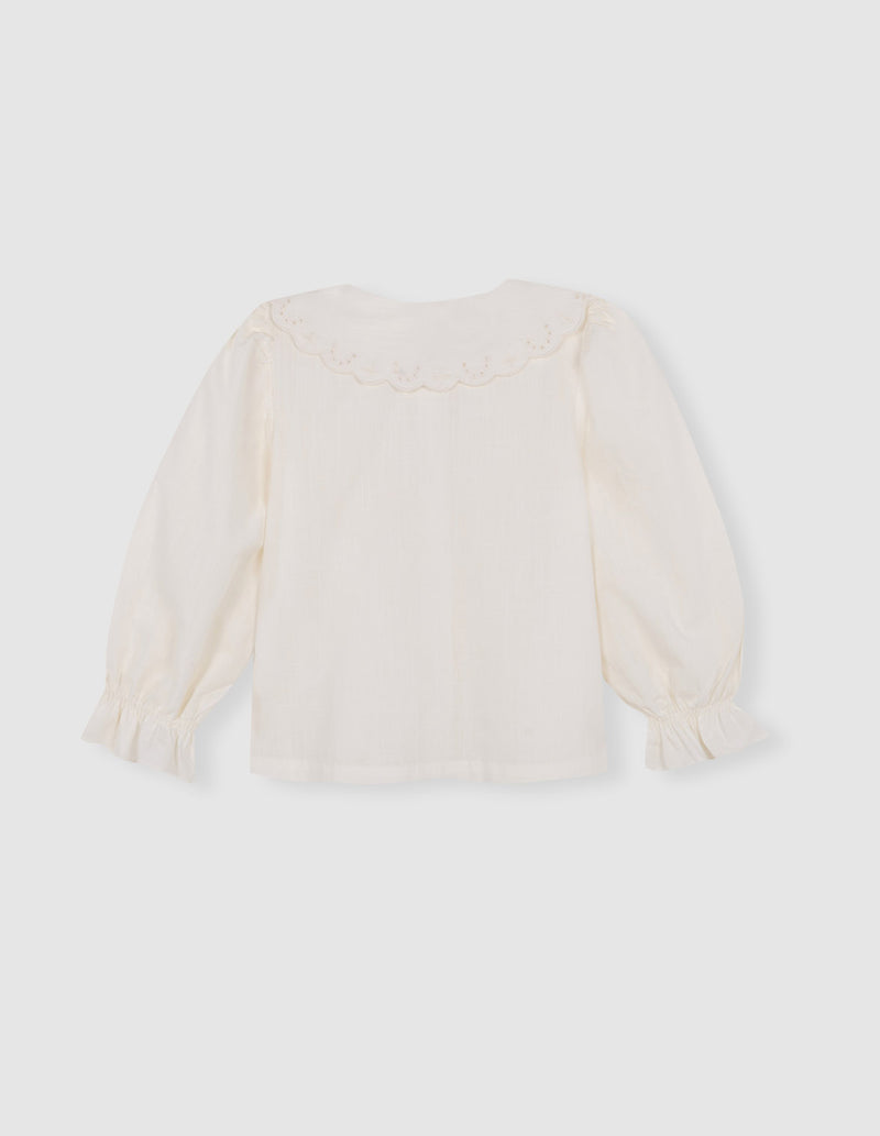 Blusa cuello ondas