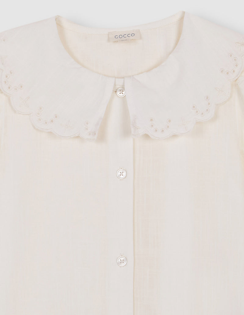 Blusa cuello ondas