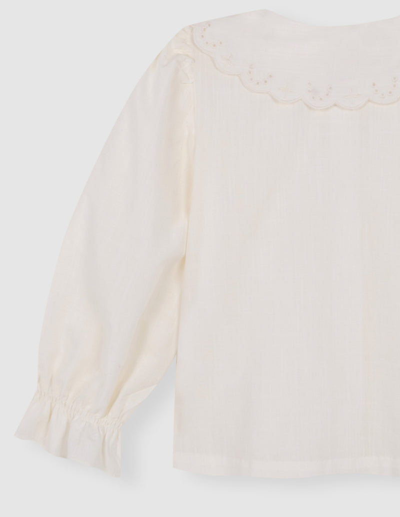 Blusa cuello ondas