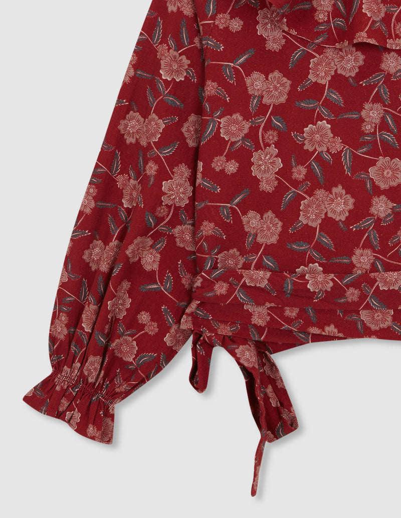 Blusa cruzada de flores