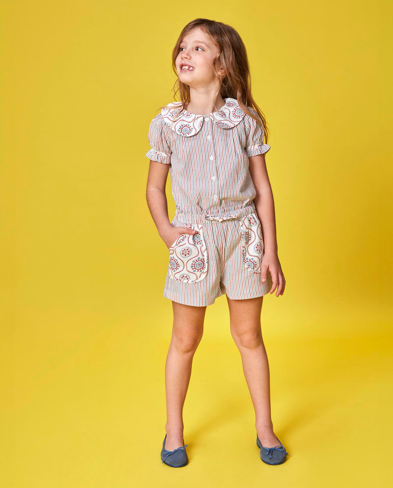 Falda pantalon con tejidos en contraste para niña
