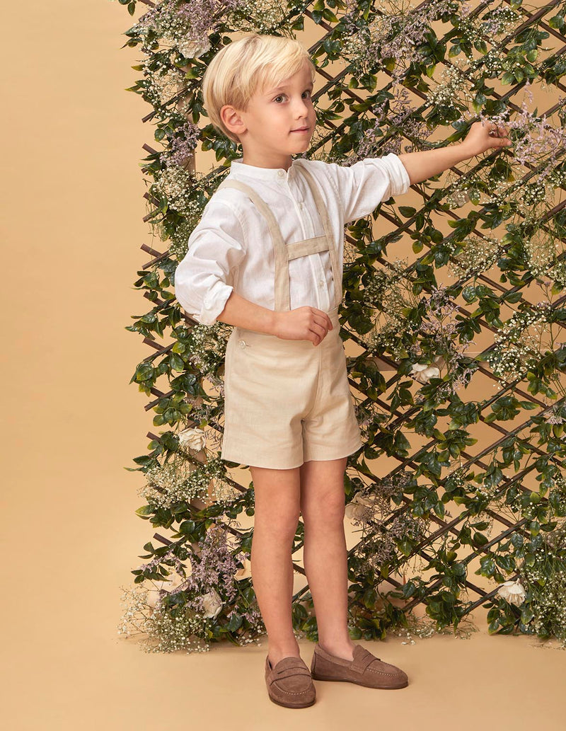 Pantalón corto de lino con tirantes