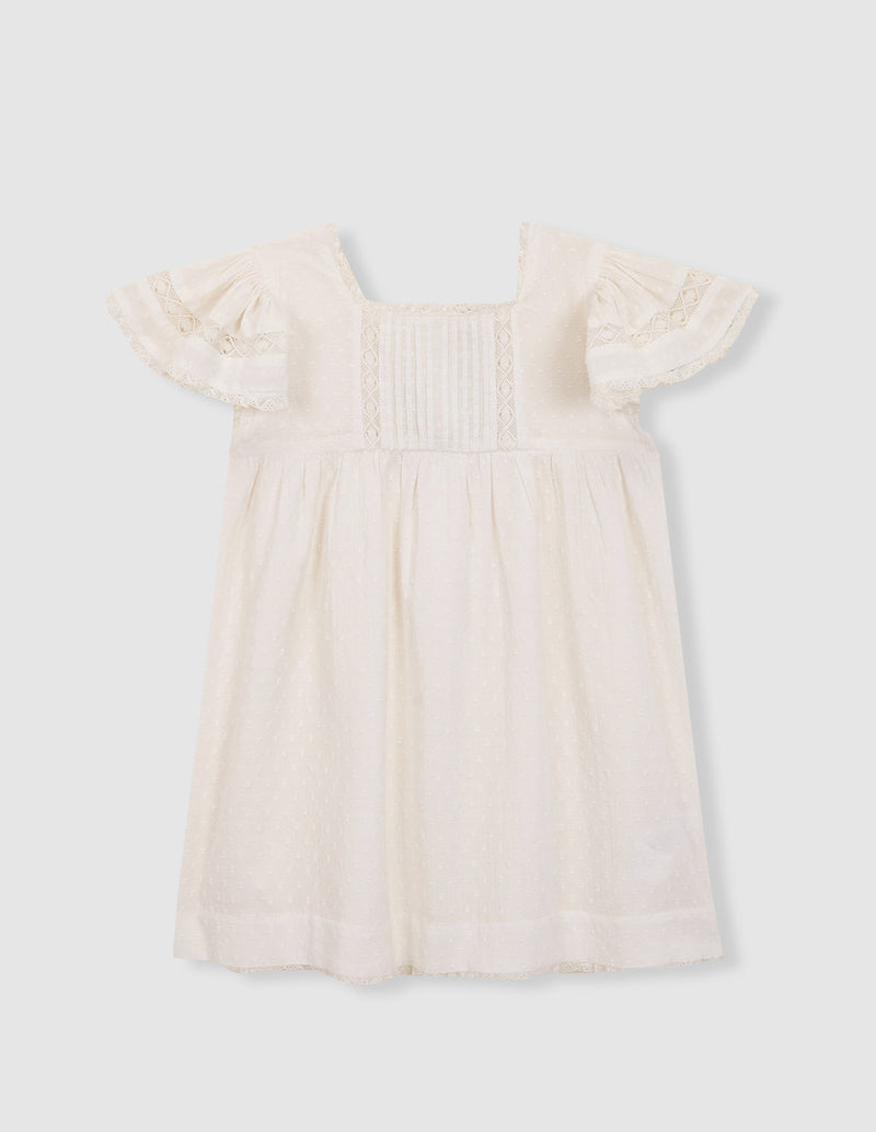 Vestido con jaretas y tiras bordadas