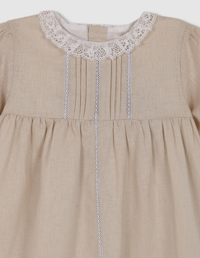 Vestido de lino con tiras bordadas