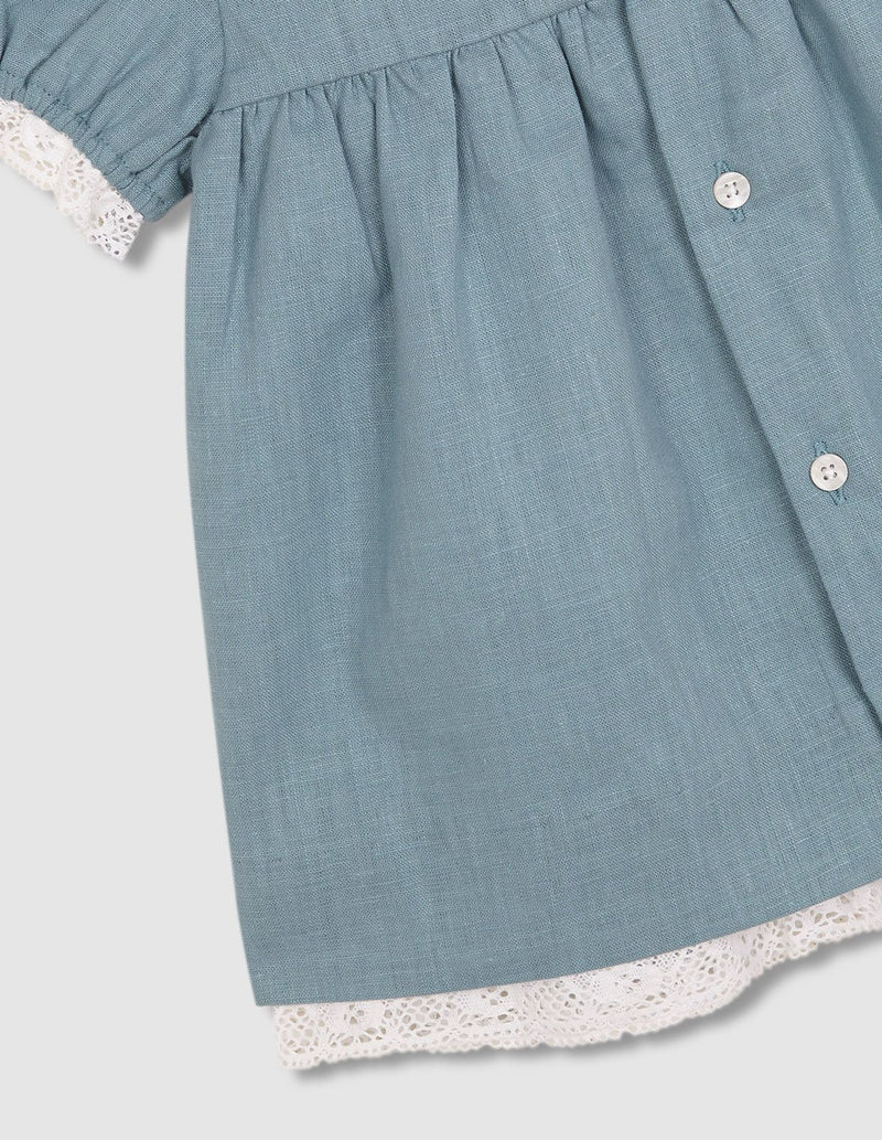 Vestido de lino con tiras bordadas