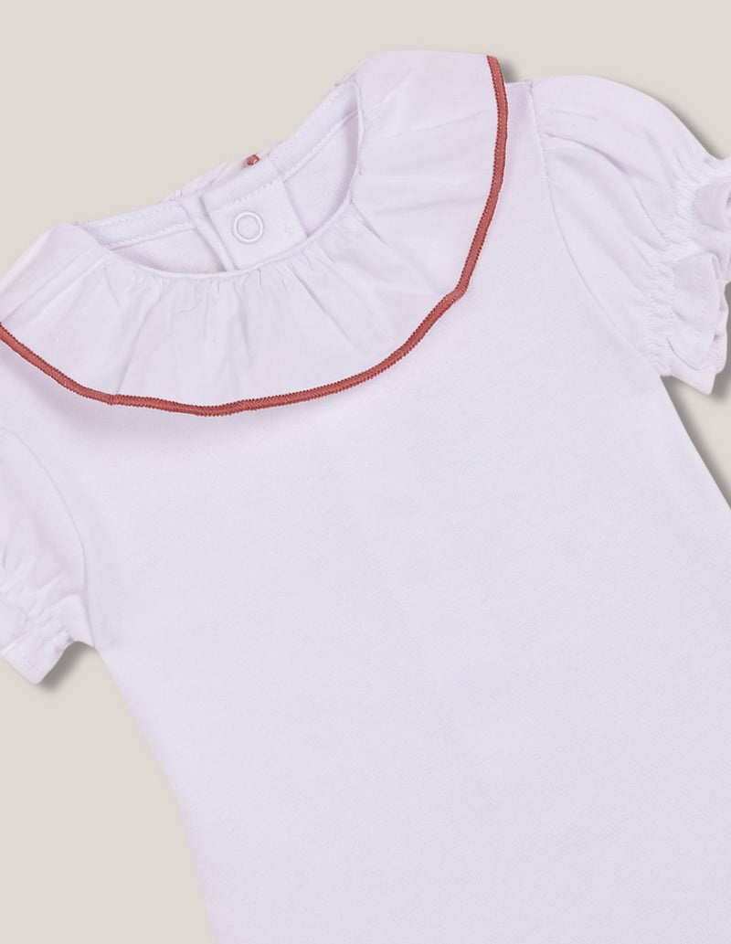 Body blanco con cuello bordado para bebé