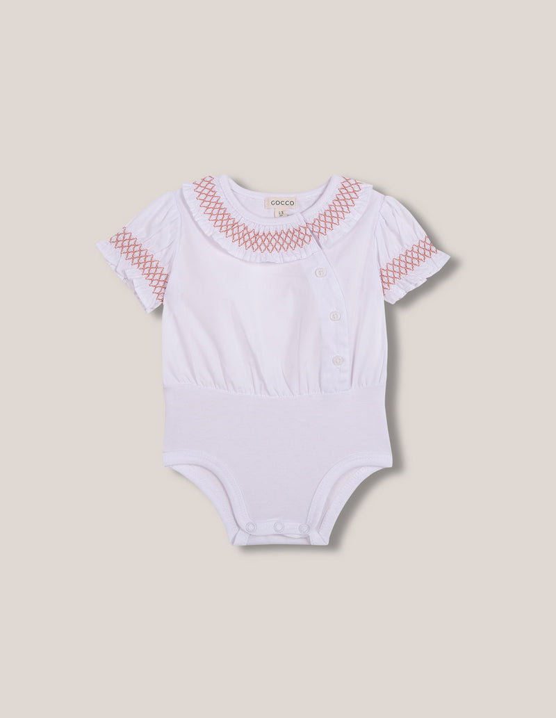 Body con bordado rojo para bebé
