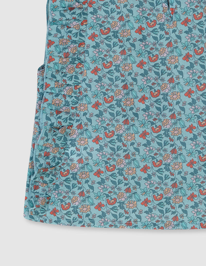 Blusa azul turquesa para niña