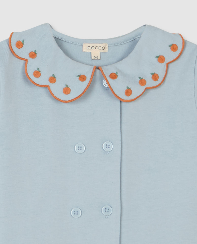 Pijama para niña con cuello bebé y estampado naranja