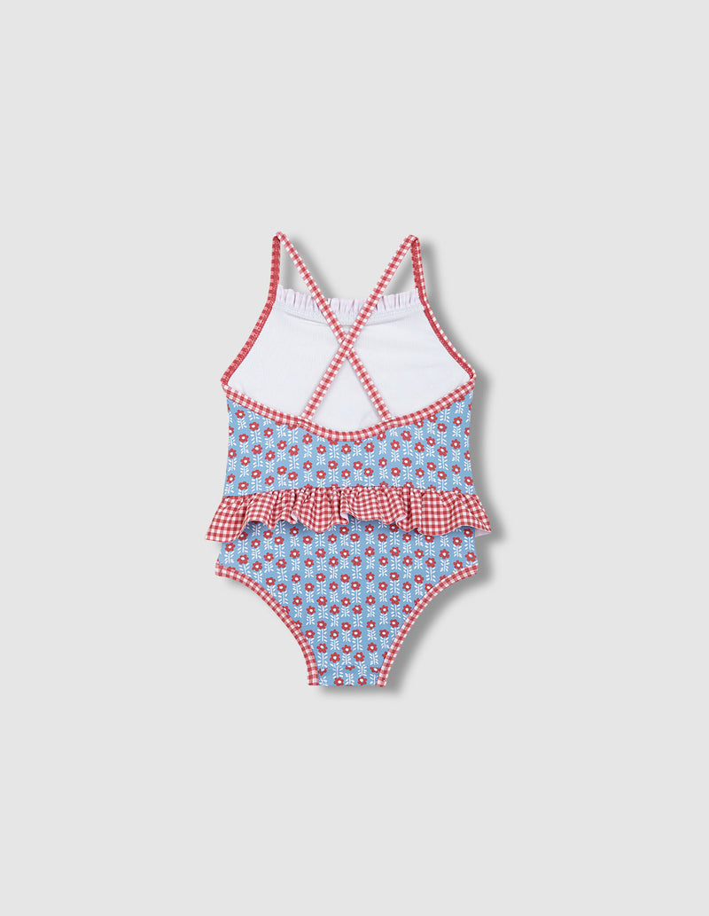 Traje de baño doble estampado y olanes niña