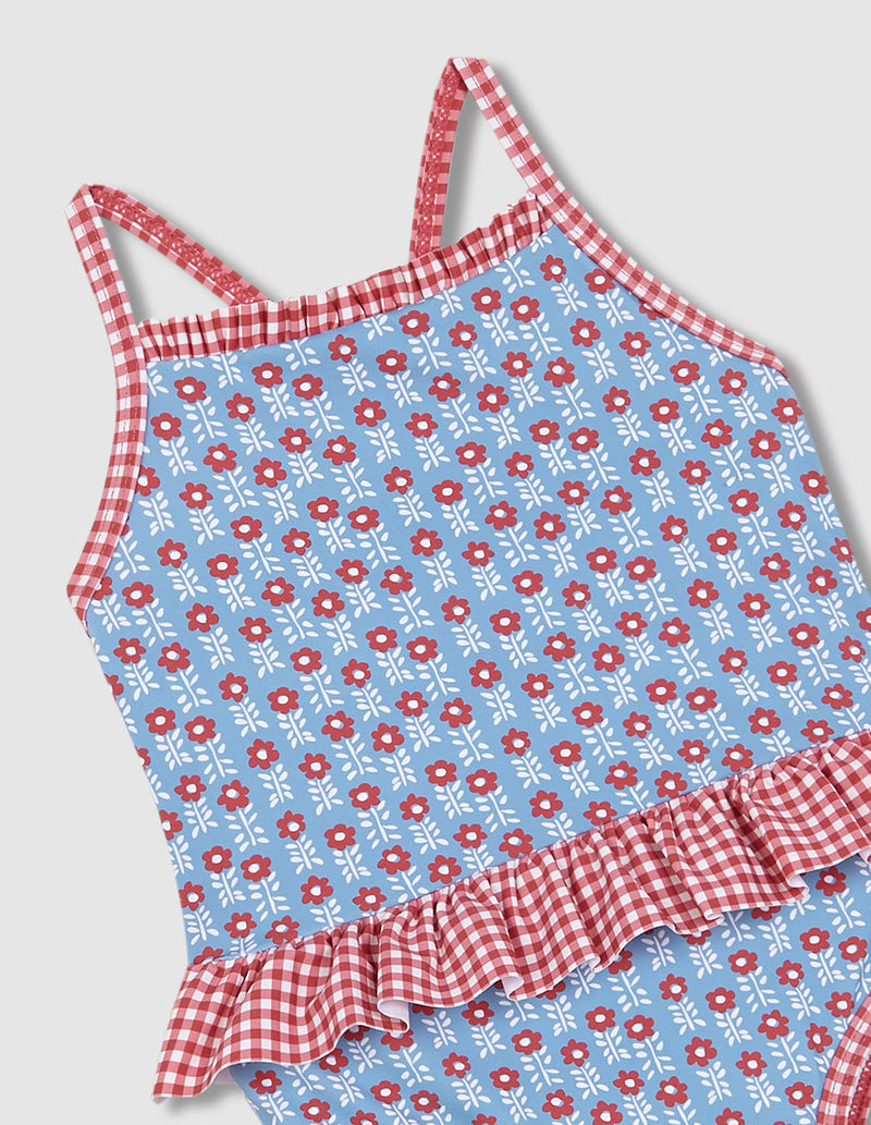 Traje de baño doble estampado y olanes niña