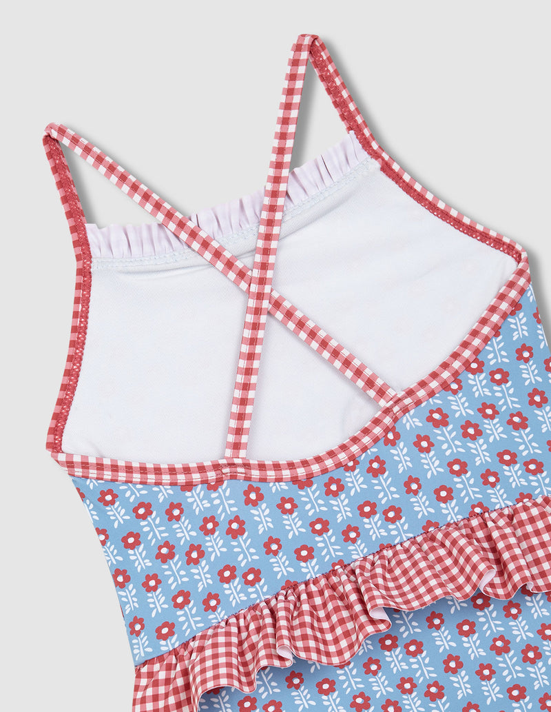 Traje de baño doble estampado y olanes niña